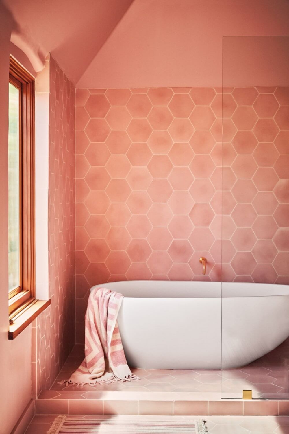 89 Pink Bathroom Ideas: From Hot Pink Walls to Blush Tiles 27 bathroom freestanding bath coral pink tiles and walls