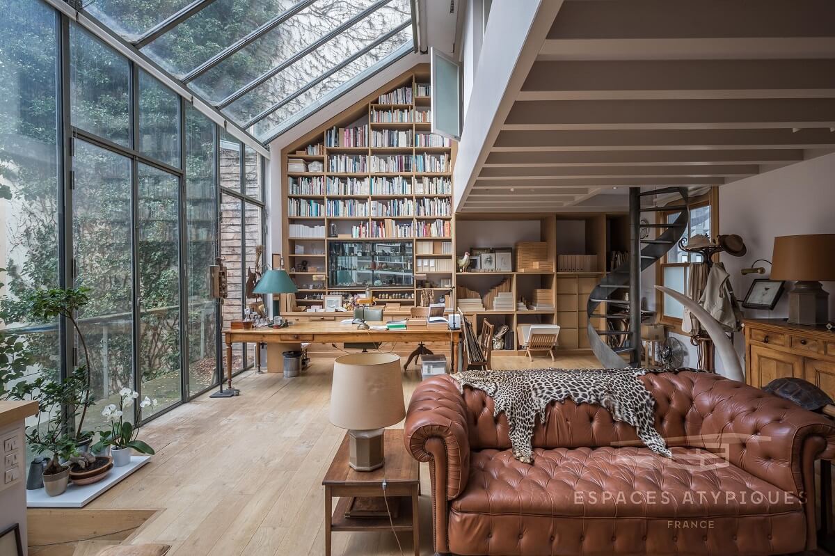 Spectacular Windows In A Serene Book-Filled Oasis in Paris 2 book filled oasis paris nordroom1 Spectacular Windows In A Serene Book-Filled Oasis in Paris