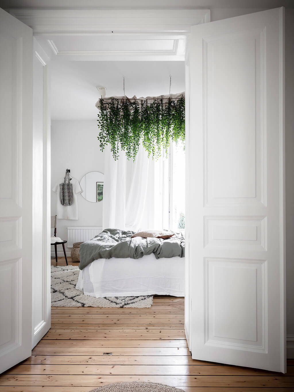 A Scandi Apartment With A Canopy of Plants in the Bedroom 12 scandinavian apartment canopy plants nordroom11 A Scandi Apartment With A Canopy of Plants in the Bedroom