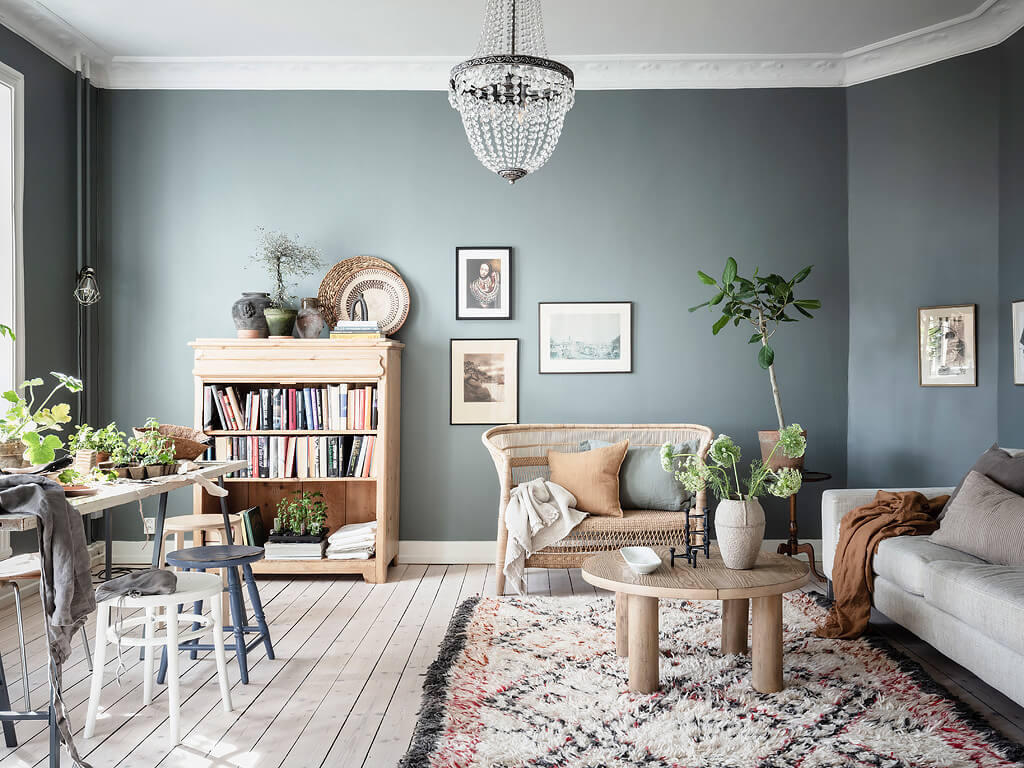 A Charming Swedish Apartment with Blue Walls and Plants 1 small blue scandinavian apartment nordroom A Charming Swedish Apartment with Blue Walls and Plants