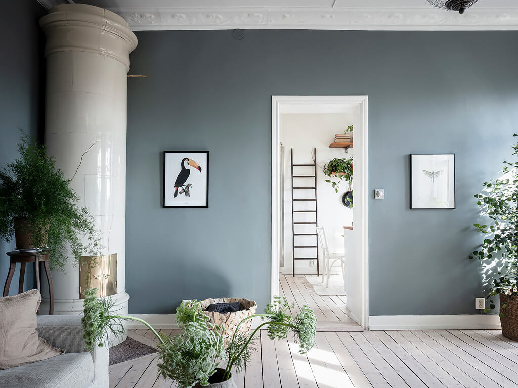 A Charming Swedish Apartment with Blue Walls and Plants 8 small blue scandinavian apartment nordroom7 A Charming Swedish Apartment with Blue Walls and Plants