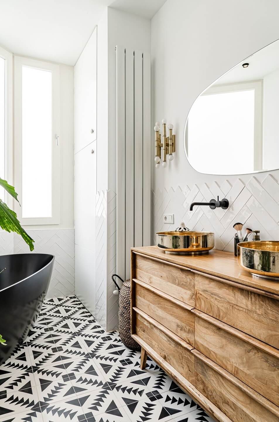 Inspiring Bathrooms With Geometric Tiles 1 bathroom with black and white geometric floor tiles nordroom