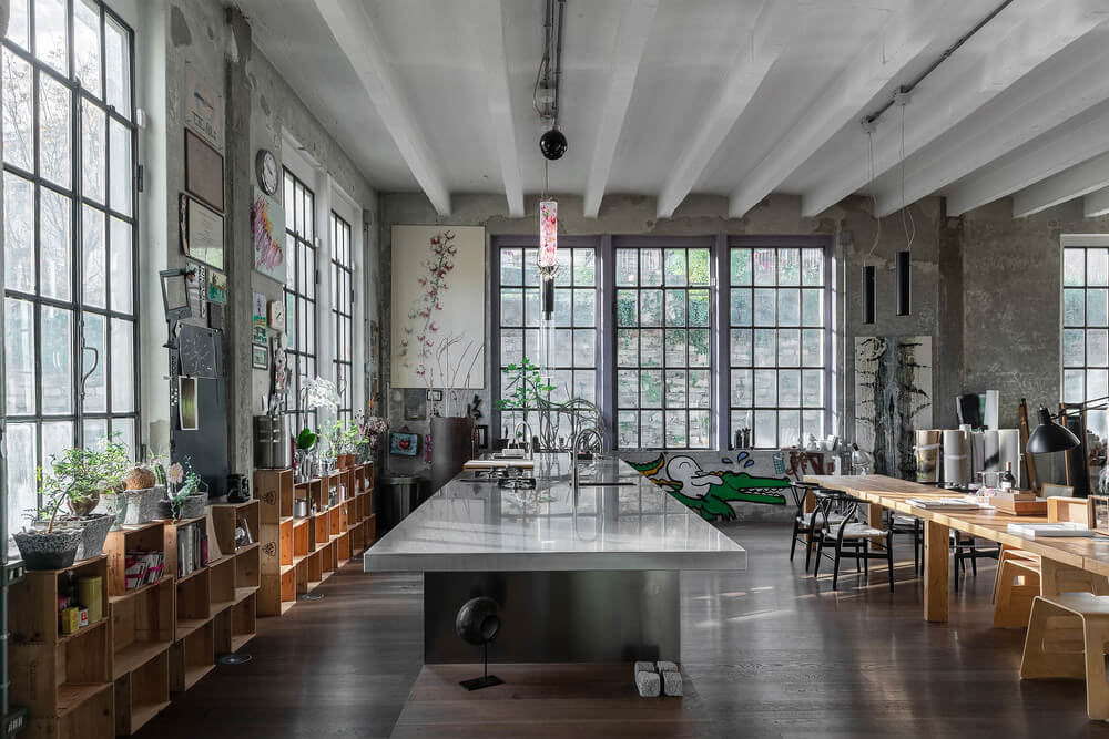 An Industrial Artist Loft in Italy With Jaw Dropping Windows 1 industrial artist loft italy nordroom An Industrial Artist Loft in Italy With Jaw Dropping Windows