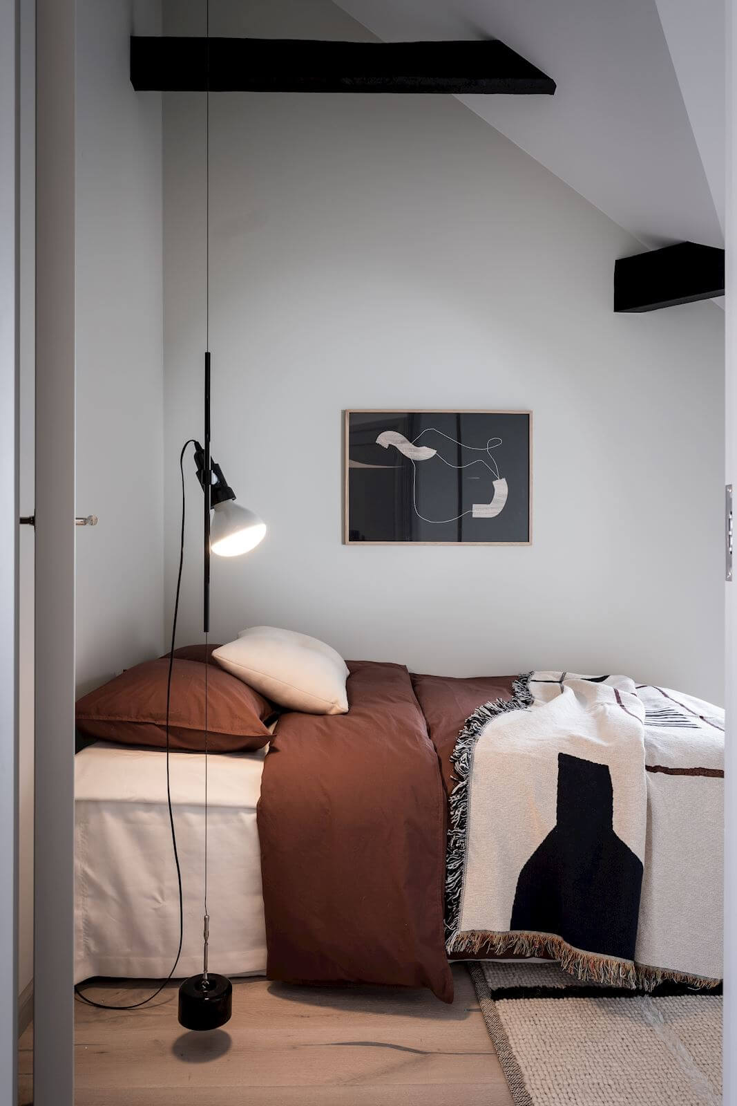 A Bright And Stylish Scandinavian Attic Apartment 11 scandinavian attic apartment nordroom10 A Bright And Stylish Scandinavian Attic Apartment