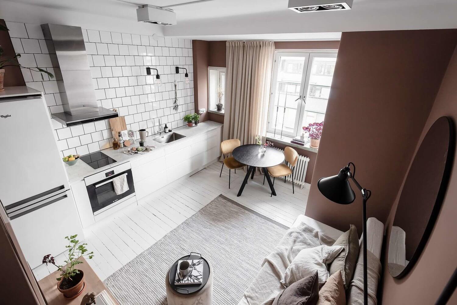 A Tiny Pink Studio Apartment with Loft Bed and Walk in Closet 1 pink studio apartment loft bed walk in closet nordroom A Tiny Pink Studio Apartment with Loft Bed and Walk in Closet