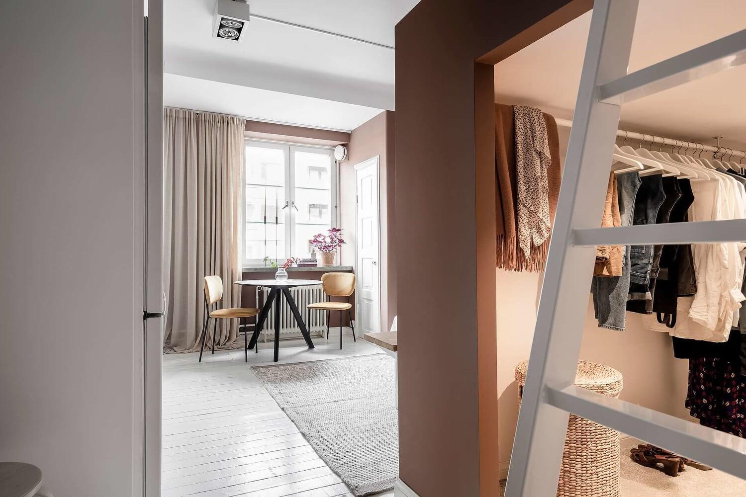 A Tiny Pink Studio Apartment with Loft Bed and Walk in Closet 14 pink studio apartment loft bed walk in closet nordroom13 A Tiny Pink Studio Apartment with Loft Bed and Walk in Closet