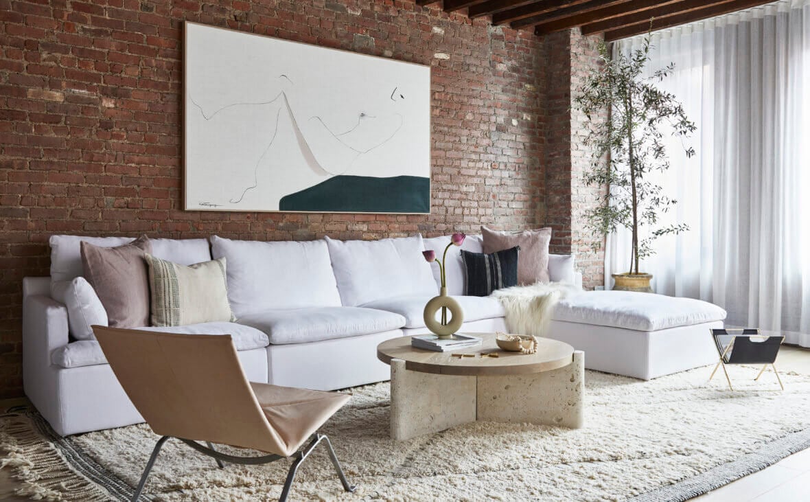soho loft exposed brick nordroom A SoHo Loft with Exposed Brick and Subtle Color Touches