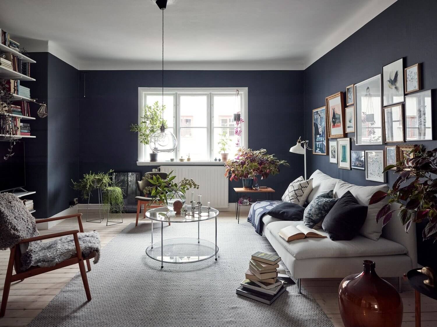A Cozy Apartment With A Deep Blue Living Room 1 cozy apartment blue living room nordroom A Cozy Apartment With A Deep Blue Living Room
