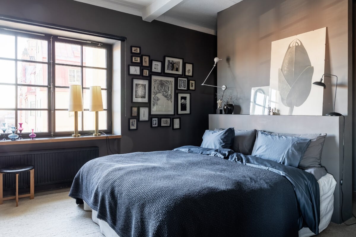 A Monochrome Design Home in a Former Chocolate Factory 12 dark bedroom with art