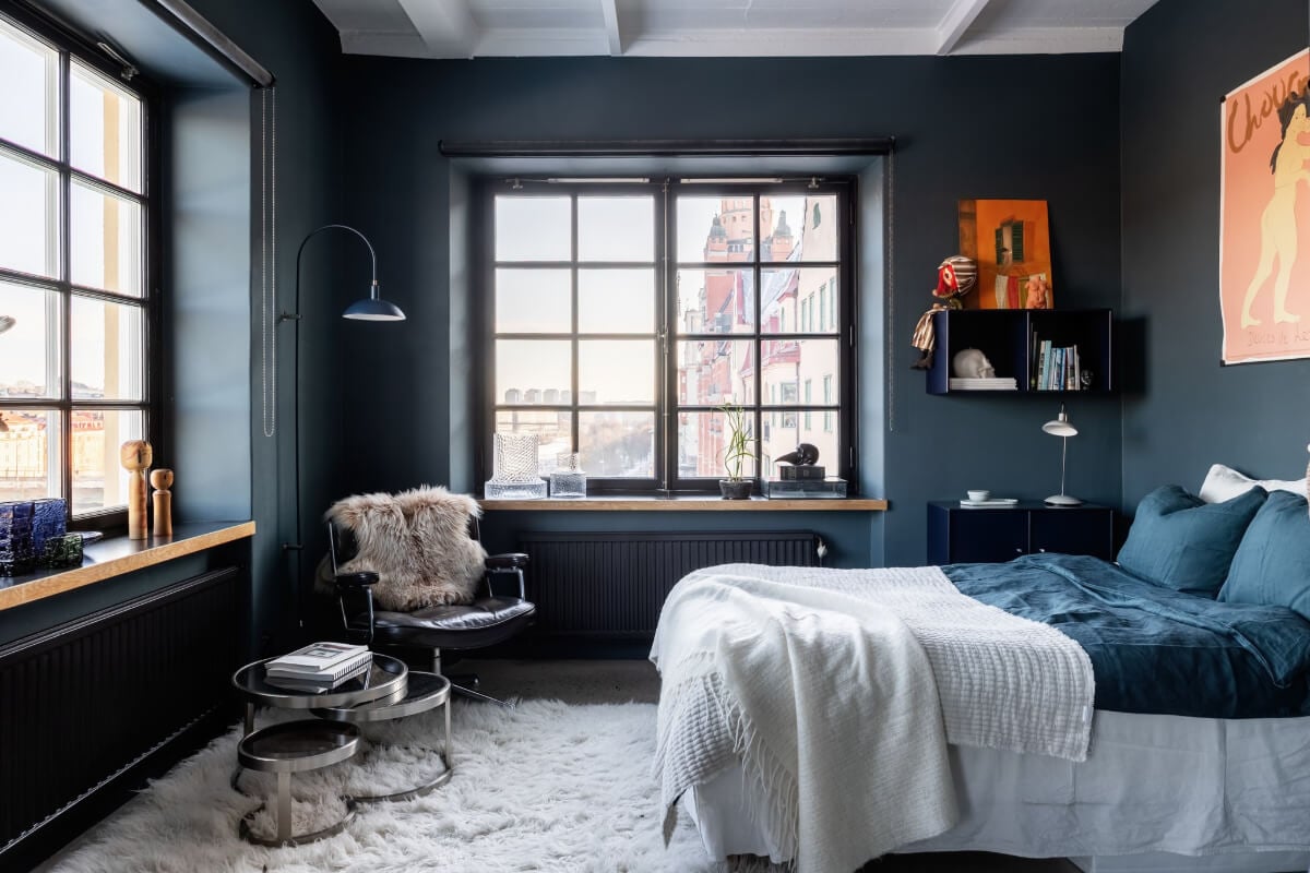 A Monochrome Design Home in a Former Chocolate Factory 14 dark blue bedroom large windows cozy rug