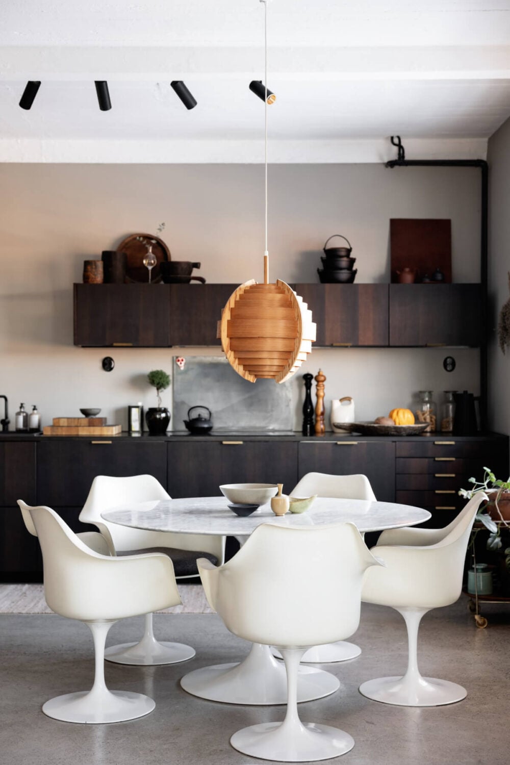 A Monochrome Design Home in a Former Chocolate Factory 8 dining table white chairs
