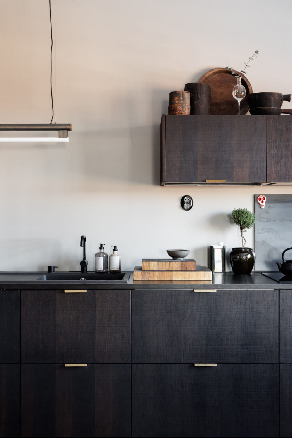 A Monochrome Design Home in a Former Chocolate Factory 9 kitchen brass handles
