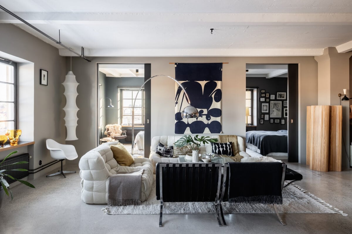 A Monochrome Design Home in a Former Chocolate Factory 3 living room concrete floor large hand-blown windows