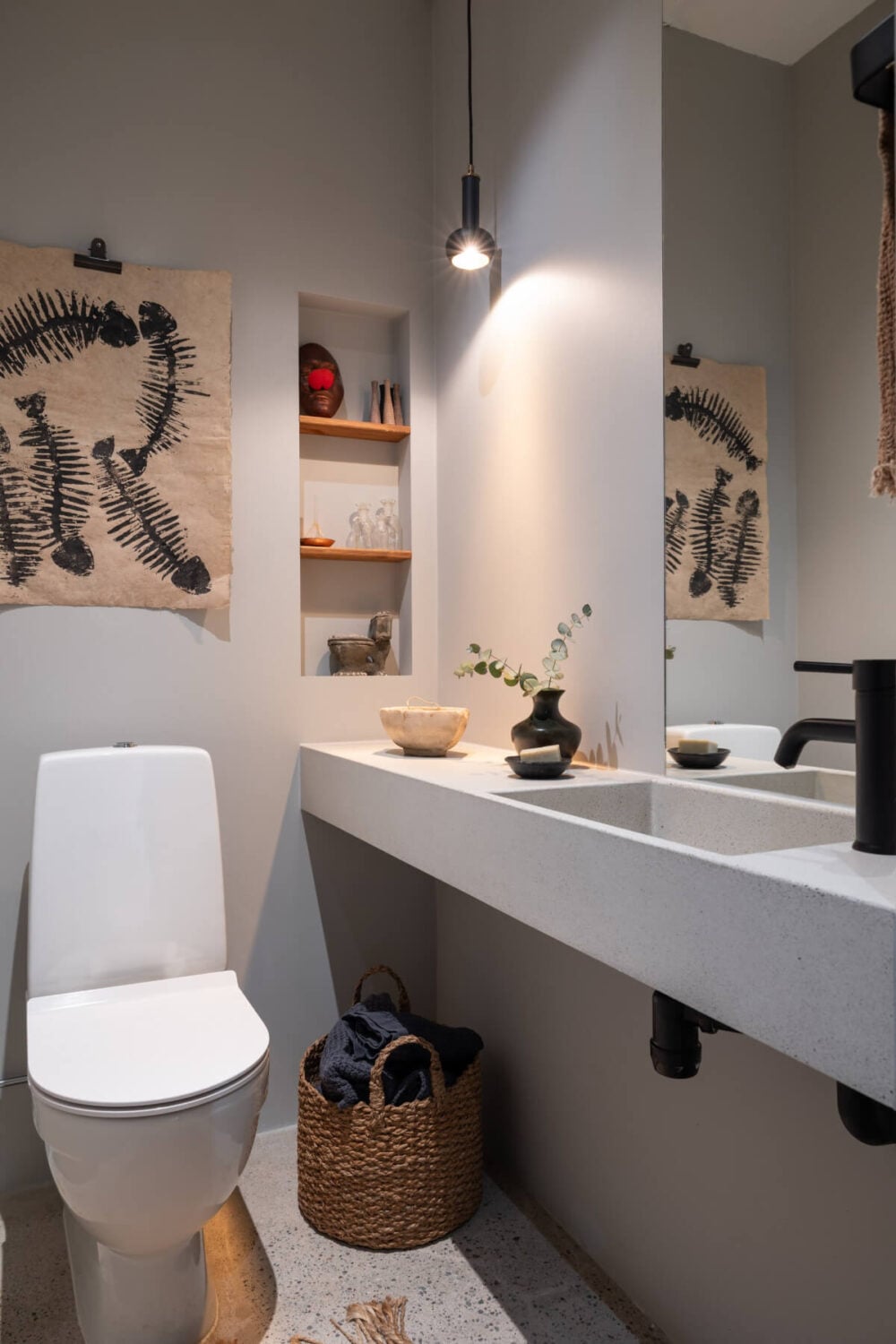 A Monochrome Design Home in a Former Chocolate Factory 18 powder room concrete sink small niche with shelves