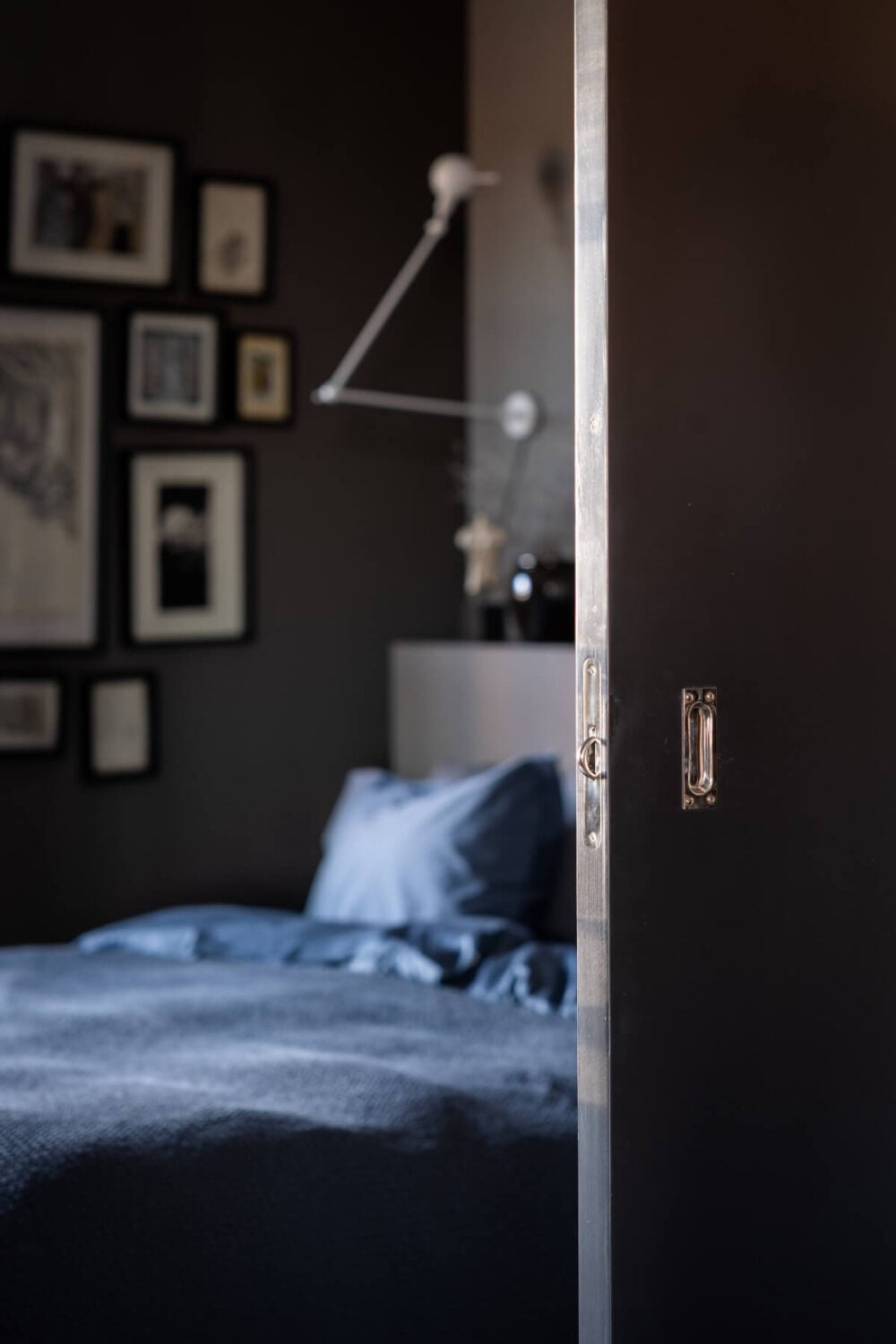 A Monochrome Design Home in a Former Chocolate Factory 11 sliding door to bedroom