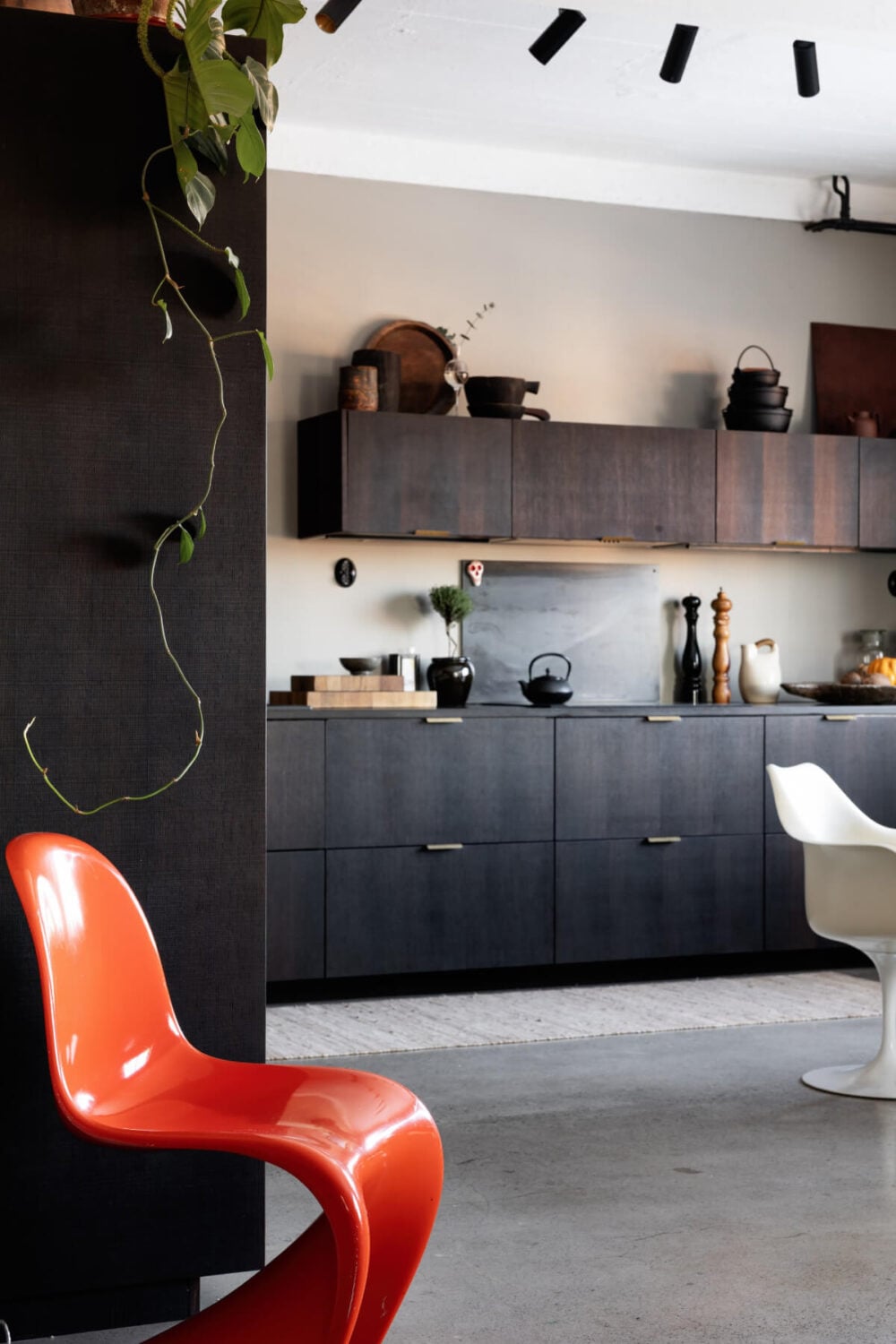 A Monochrome Design Home in a Former Chocolate Factory 6 wood reform cph kitchen orange chair