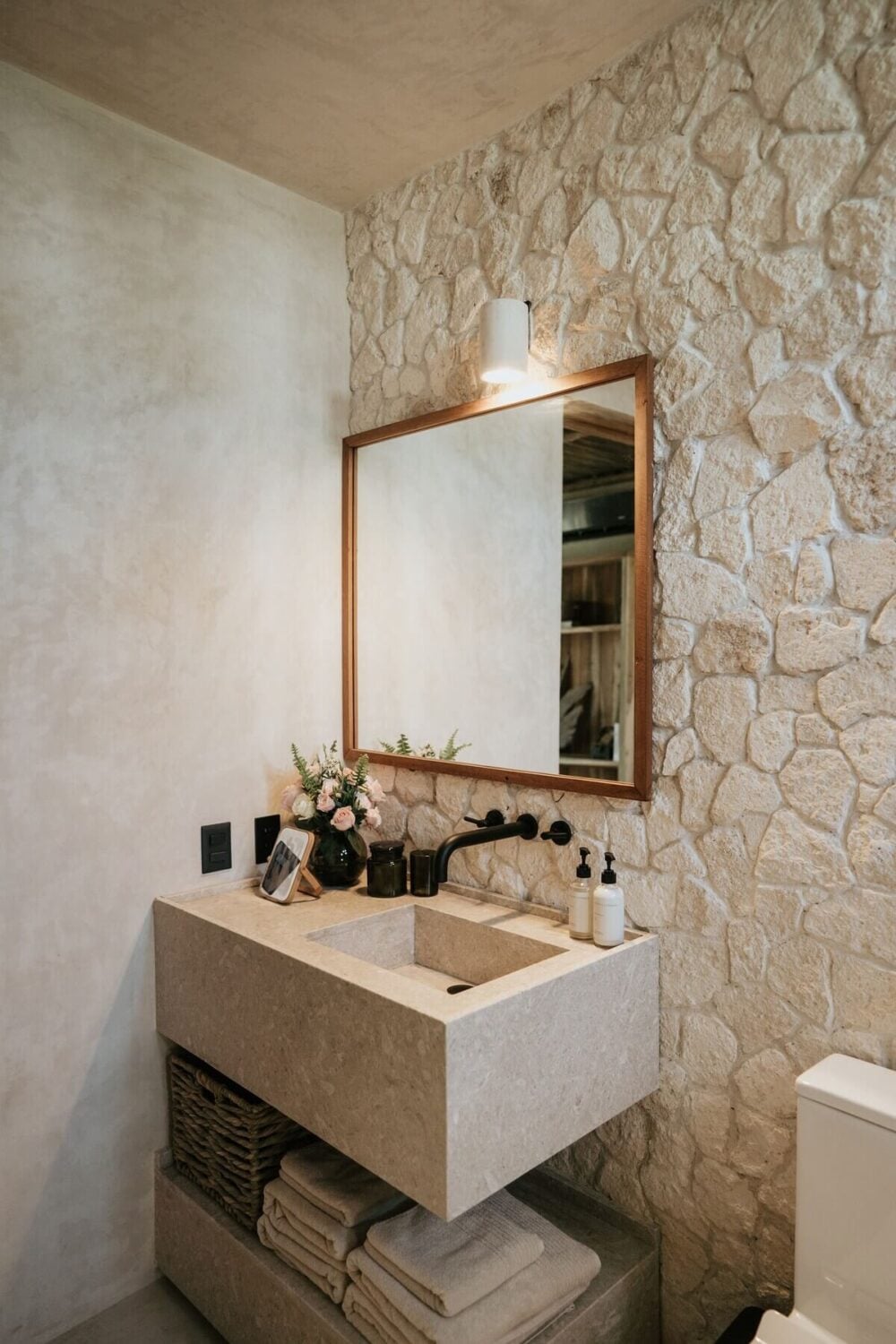 A Design SPA Apartment in Tulum Surrounded by Nature 18 natural-stone-bathroom-tulum-airbnb-nordroom