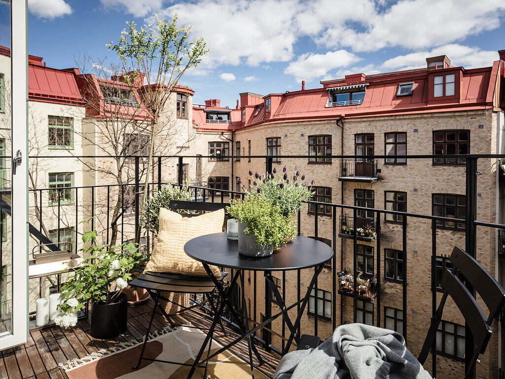 A Scandinavian Apartment with Exposed Brick Wall and Colorful Touches 15 scandinavian apartment exposed brick nordroom15 A Scandinavian Apartment with Exposed Brick Wall and Colorful Touches