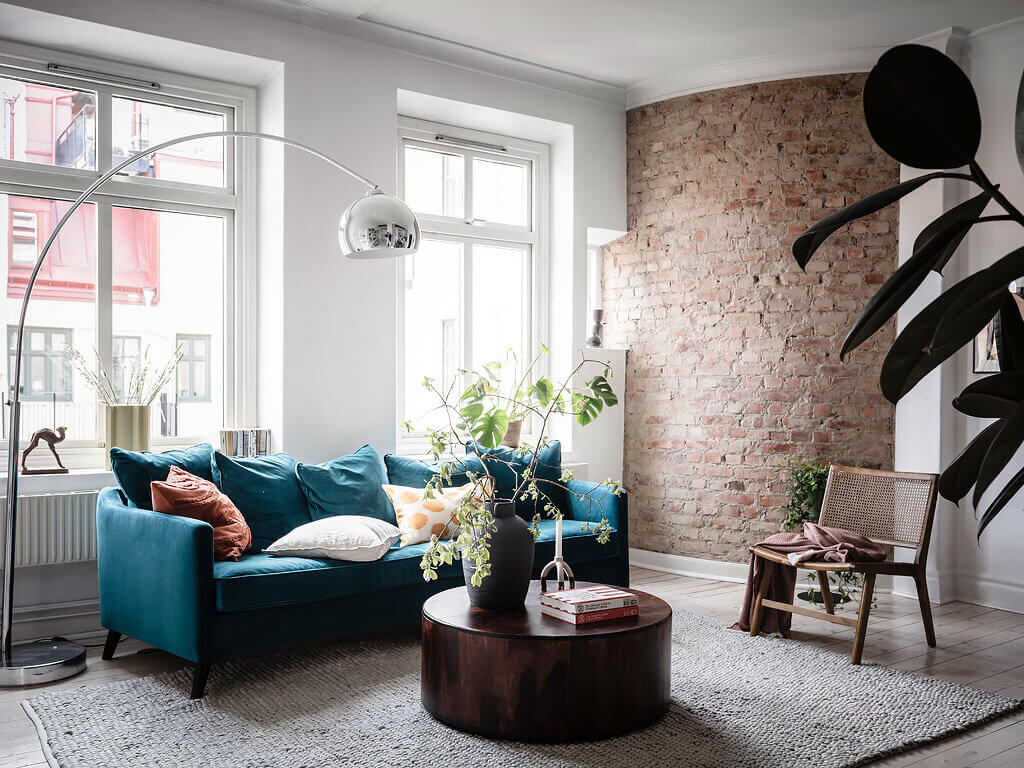 A Scandinavian Apartment with Exposed Brick Wall and Colorful Touches 4 scandinavian apartment exposed brick nordroom4 A Scandinavian Apartment with Exposed Brick Wall and Colorful Touches