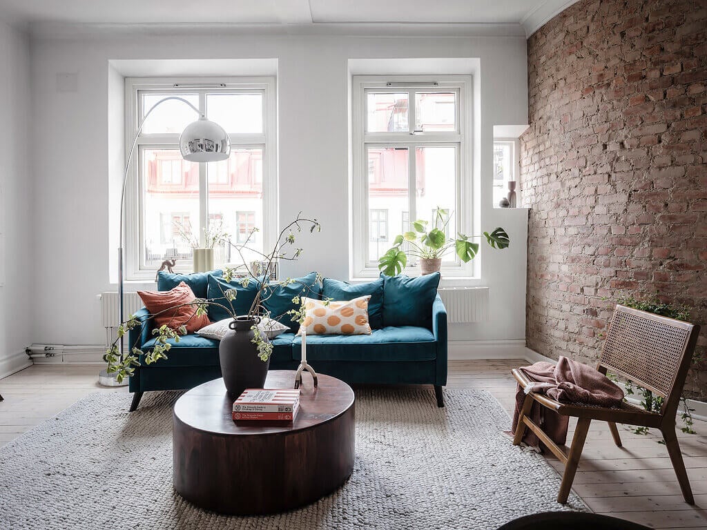 A Scandinavian Apartment with Exposed Brick Wall and Colorful Touches 5 scandinavian apartment exposed brick nordroom5 A Scandinavian Apartment with Exposed Brick Wall and Colorful Touches