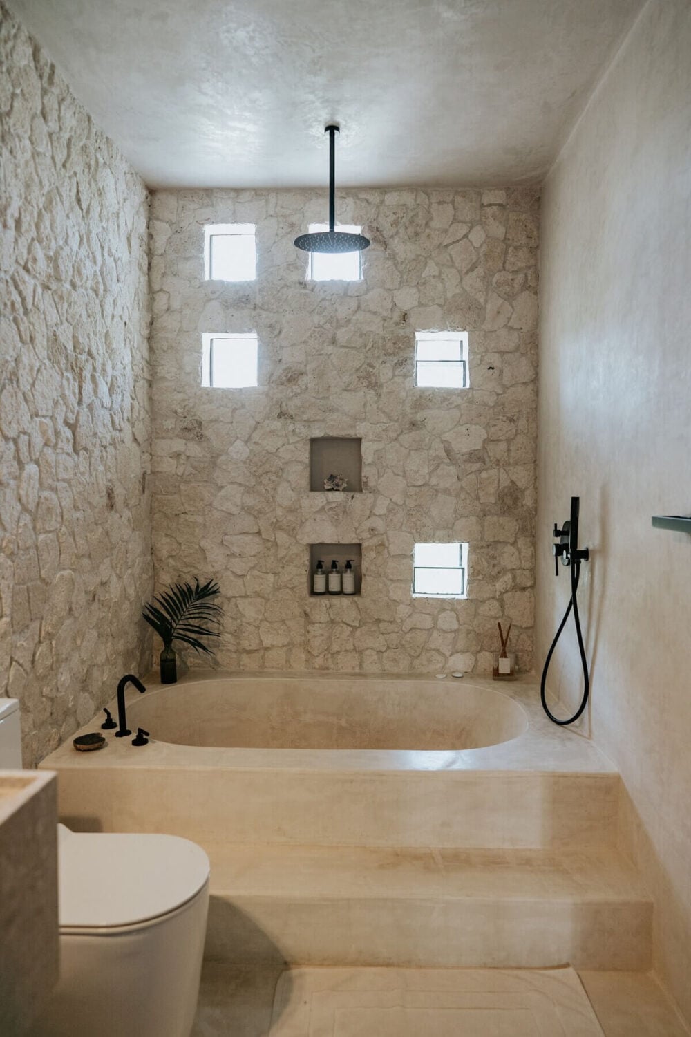 A Design SPA Apartment in Tulum Surrounded by Nature 17 tulum-airbnb-stone-bathroom-nordroom