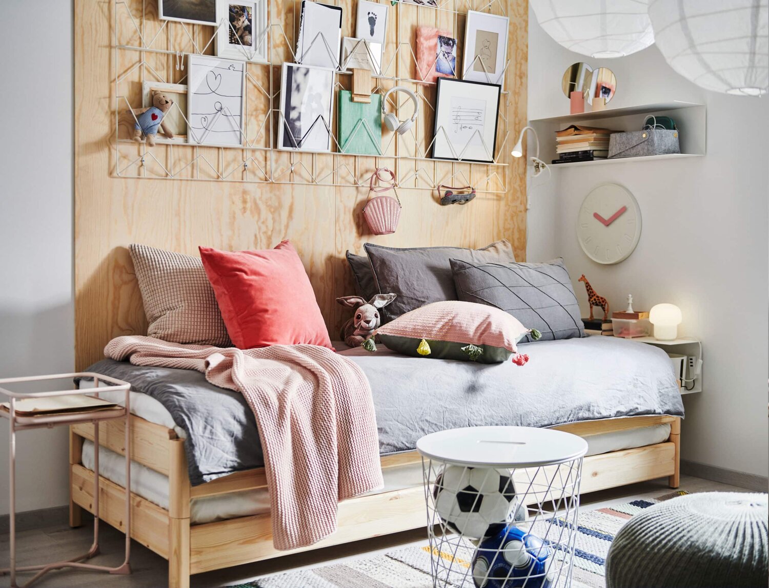 Beautiful Dorm Room Decorating Ideas 18 sofa-bed-with-plywood-wall-with-storage