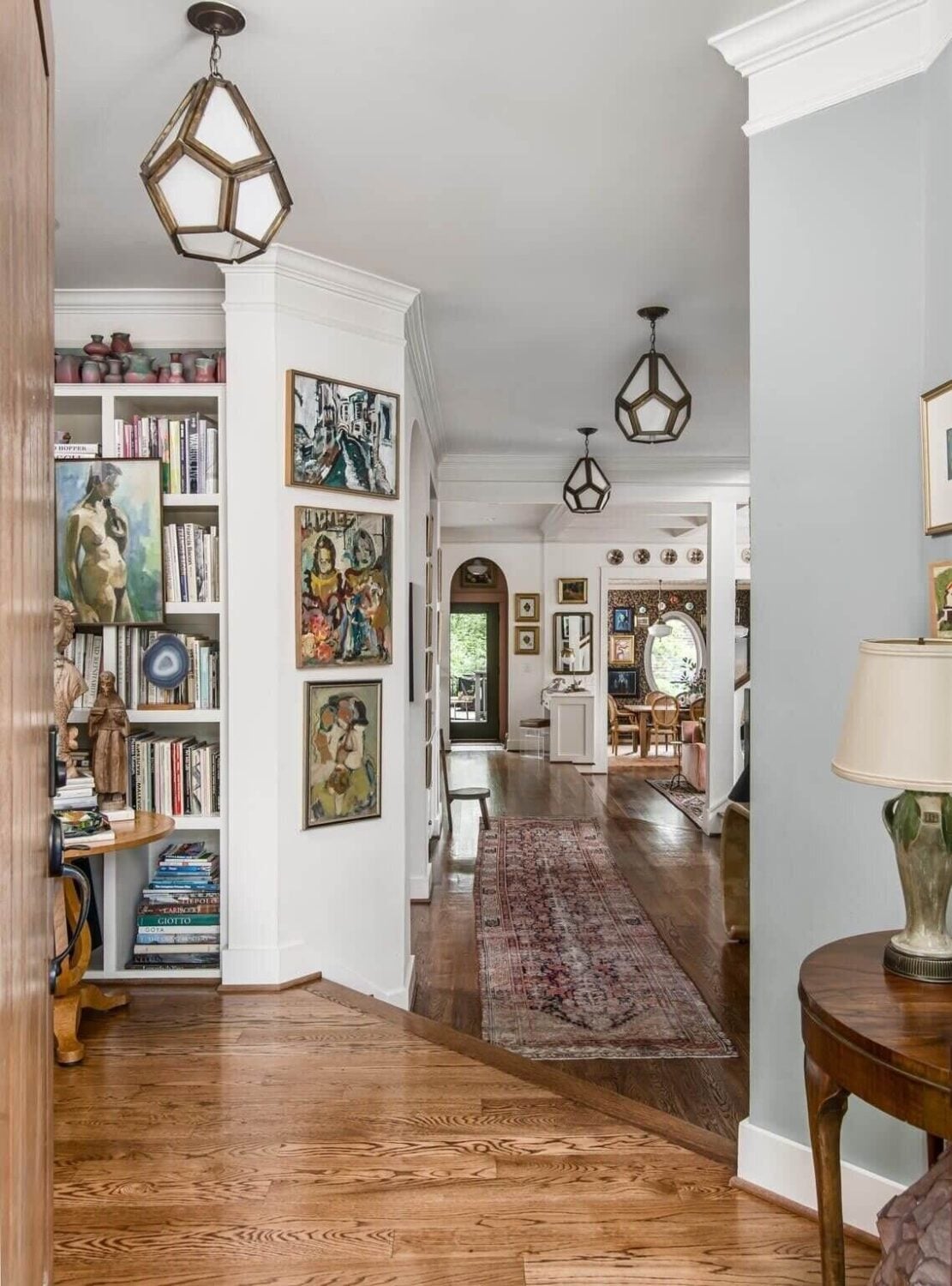 Before and After: Kacey Musgraves' Nashville Home 2 louisa-pierce-hallway-bookshelves-vintage-decor