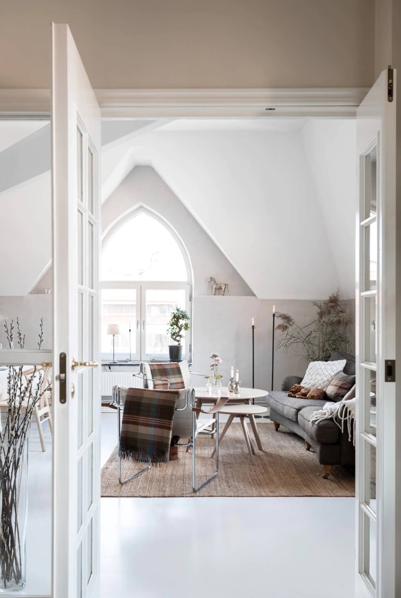 An Attic Apartment Turned Bright with White Paint and Glass Walls 3 bright attic apartmentg glass wall nordroom2 An Attic Apartment Turned Bright with White Paint and Glass Walls