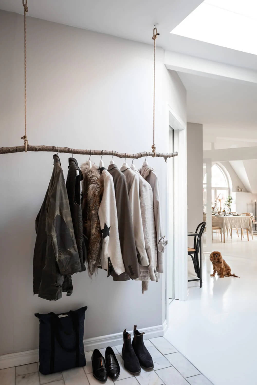 An Attic Apartment Turned Bright with White Paint and Glass Walls 8 bright attic apartmentg glass wall nordroom7 An Attic Apartment Turned Bright with White Paint and Glass Walls