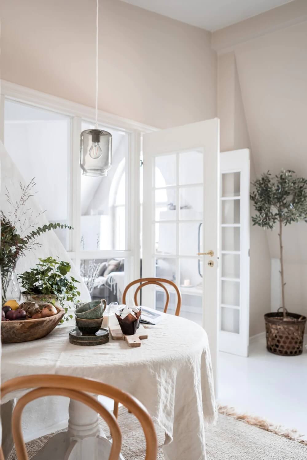 An Attic Apartment Turned Bright with White Paint and Glass Walls 9 bright attic apartmentg glass wall nordroom8 An Attic Apartment Turned Bright with White Paint and Glass Walls