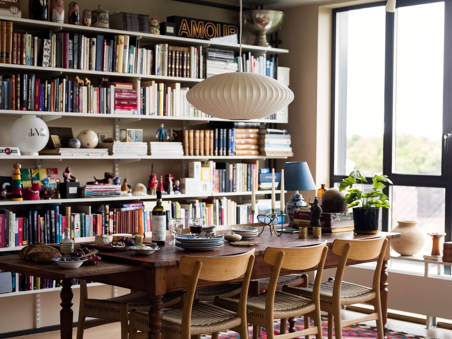 A Light Book-Filled Apartment With A Deep Blue Bedroom 3 light book filled apartment blue bedroom nordroom2 A Light Book-Filled Apartment With A Deep Blue Bedroom