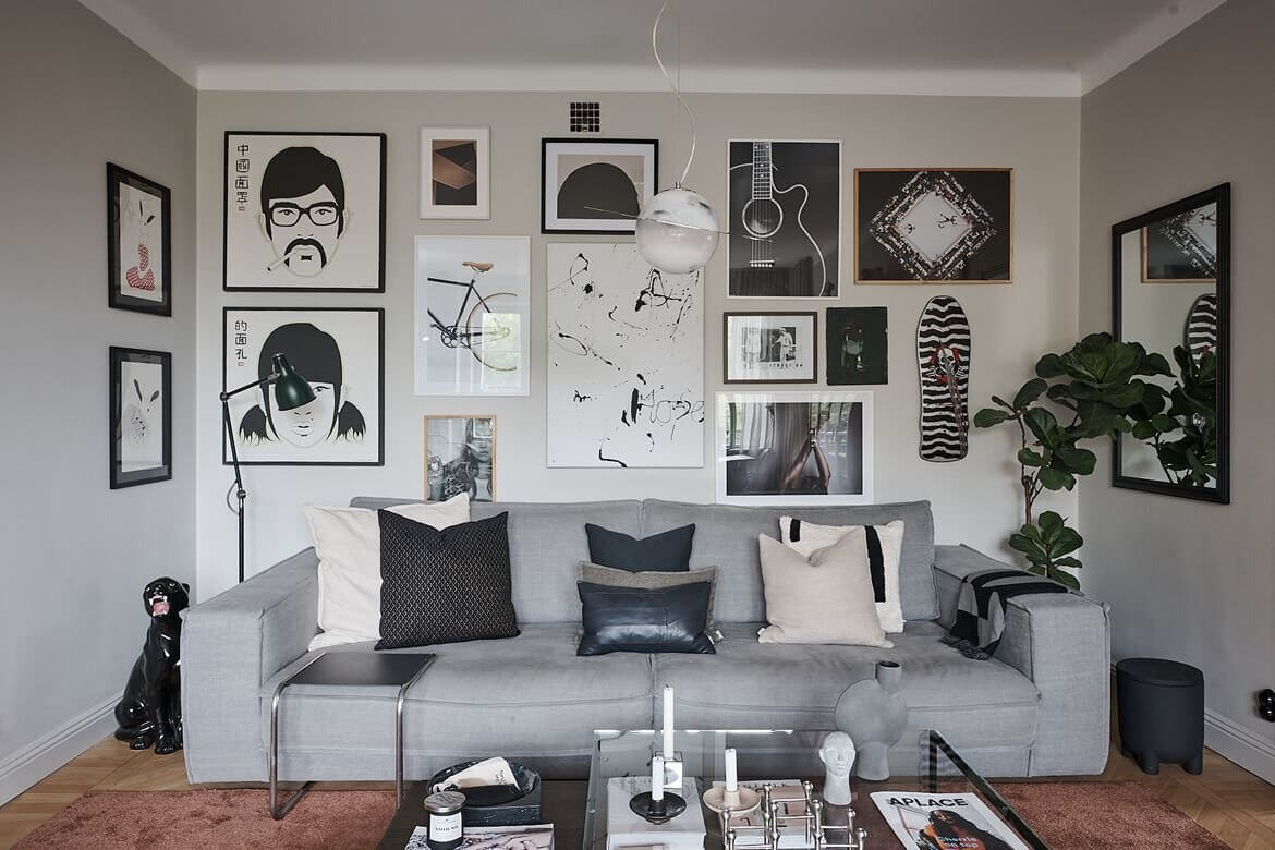 A Grey Scandinavian Apartment with Art-Filled Living Room 2 grey scandinavian apartment art nordroom1 A Grey Scandinavian Apartment with Art-Filled Living Room