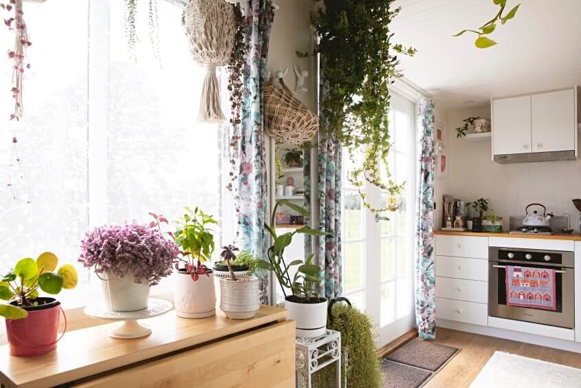 A Light and Plant-Filled Tiny House with Two Sleeping Lofts 7 tiny house plants nordroom7 A Light and Plant-Filled Tiny House with Two Sleeping Lofts