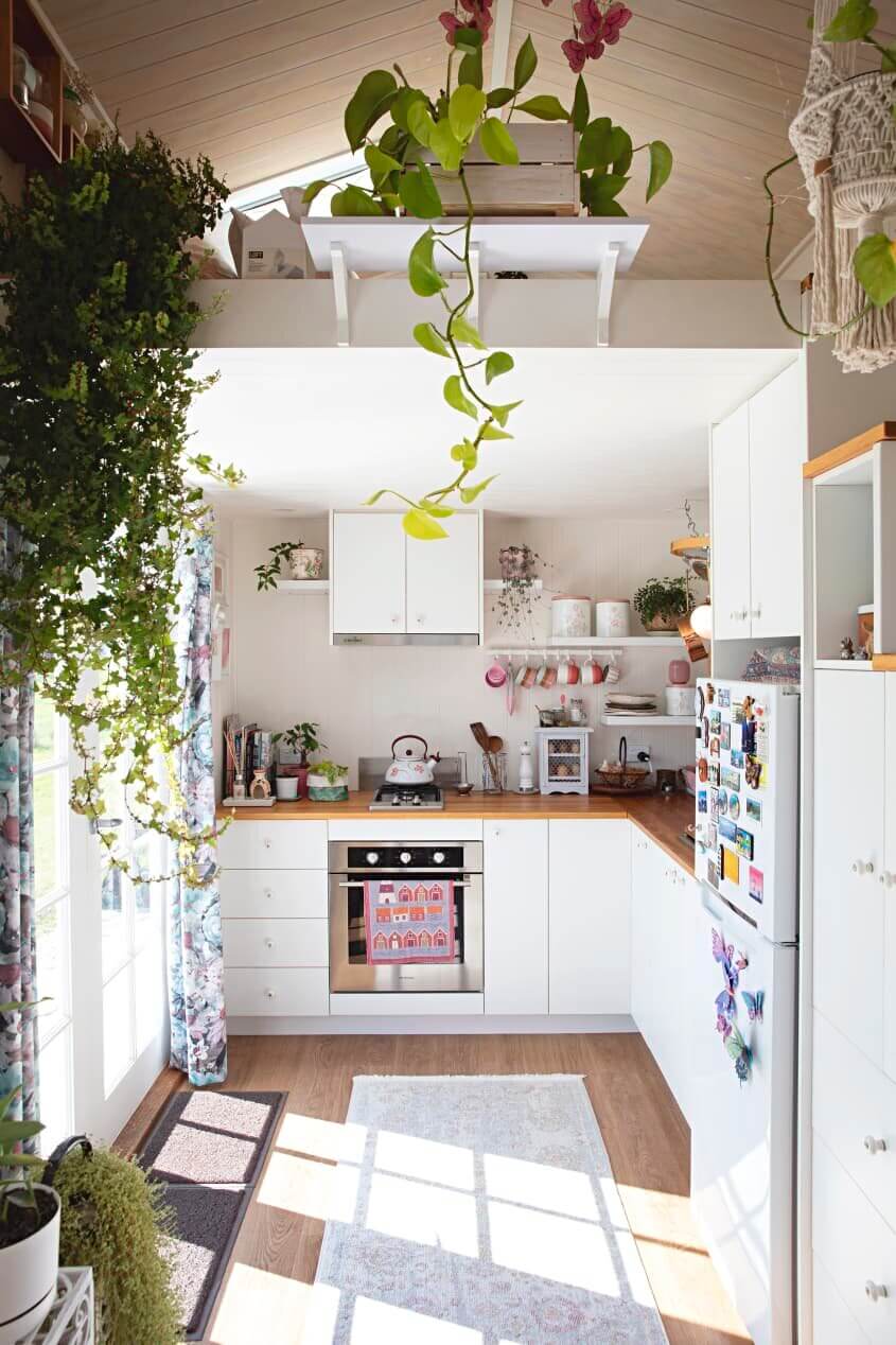 A Light and Plant-Filled Tiny House with Two Sleeping Lofts 9 tiny house plants nordroom9 A Light and Plant-Filled Tiny House with Two Sleeping Lofts