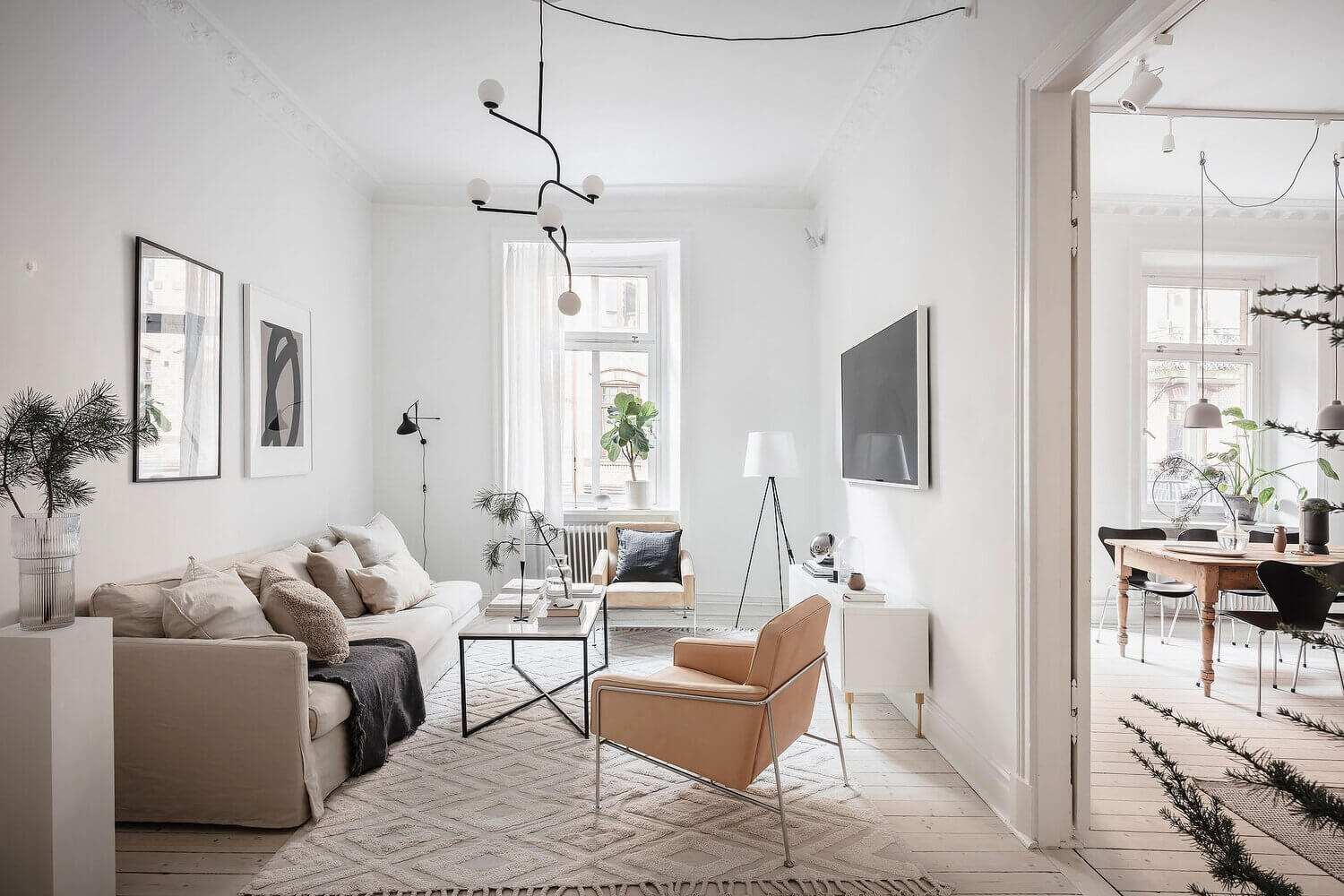 A White Scandinavian Apartment With A Sleek Dark Grey Kitchen 2 white scandinavian apartment grey kitchen nordroom1 A White Scandinavian Apartment With A Sleek Dark Grey Kitchen