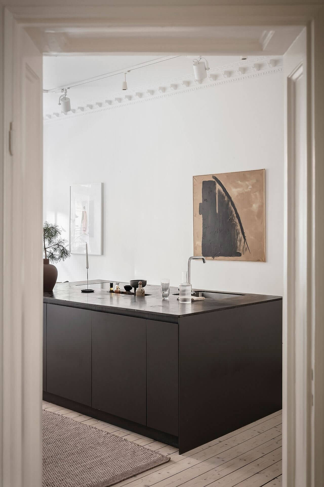 A White Scandinavian Apartment With A Sleek Dark Grey Kitchen 11 white scandinavian apartment grey kitchen nordroom10 A White Scandinavian Apartment With A Sleek Dark Grey Kitchen
