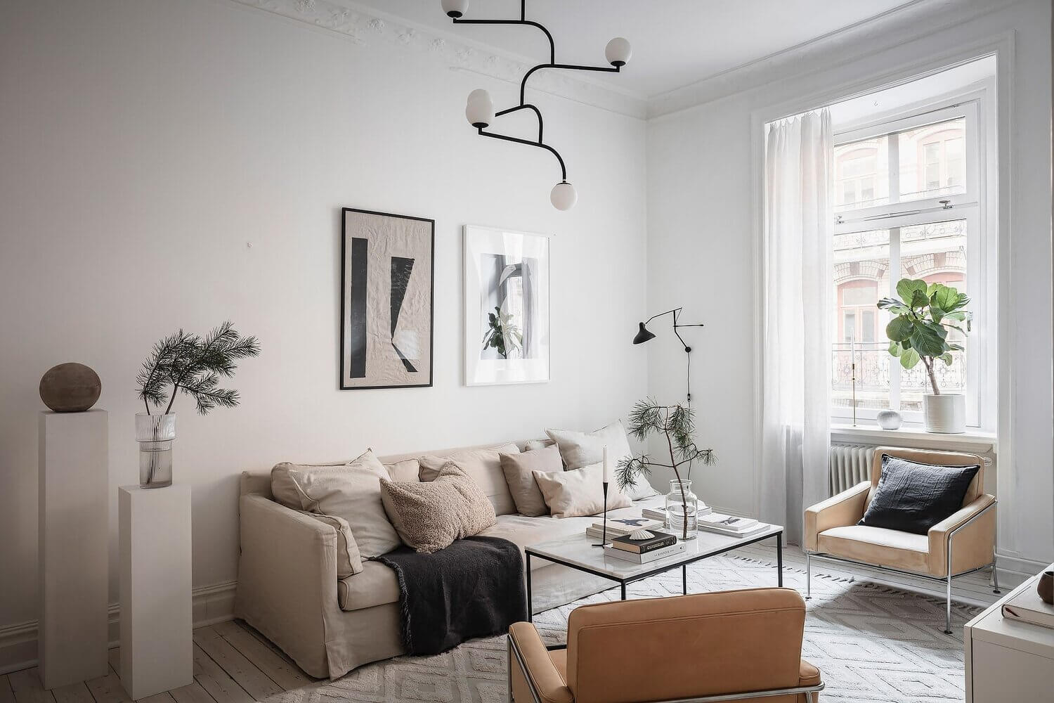 A White Scandinavian Apartment With A Sleek Dark Grey Kitchen 3 white scandinavian apartment grey kitchen nordroom2 A White Scandinavian Apartment With A Sleek Dark Grey Kitchen