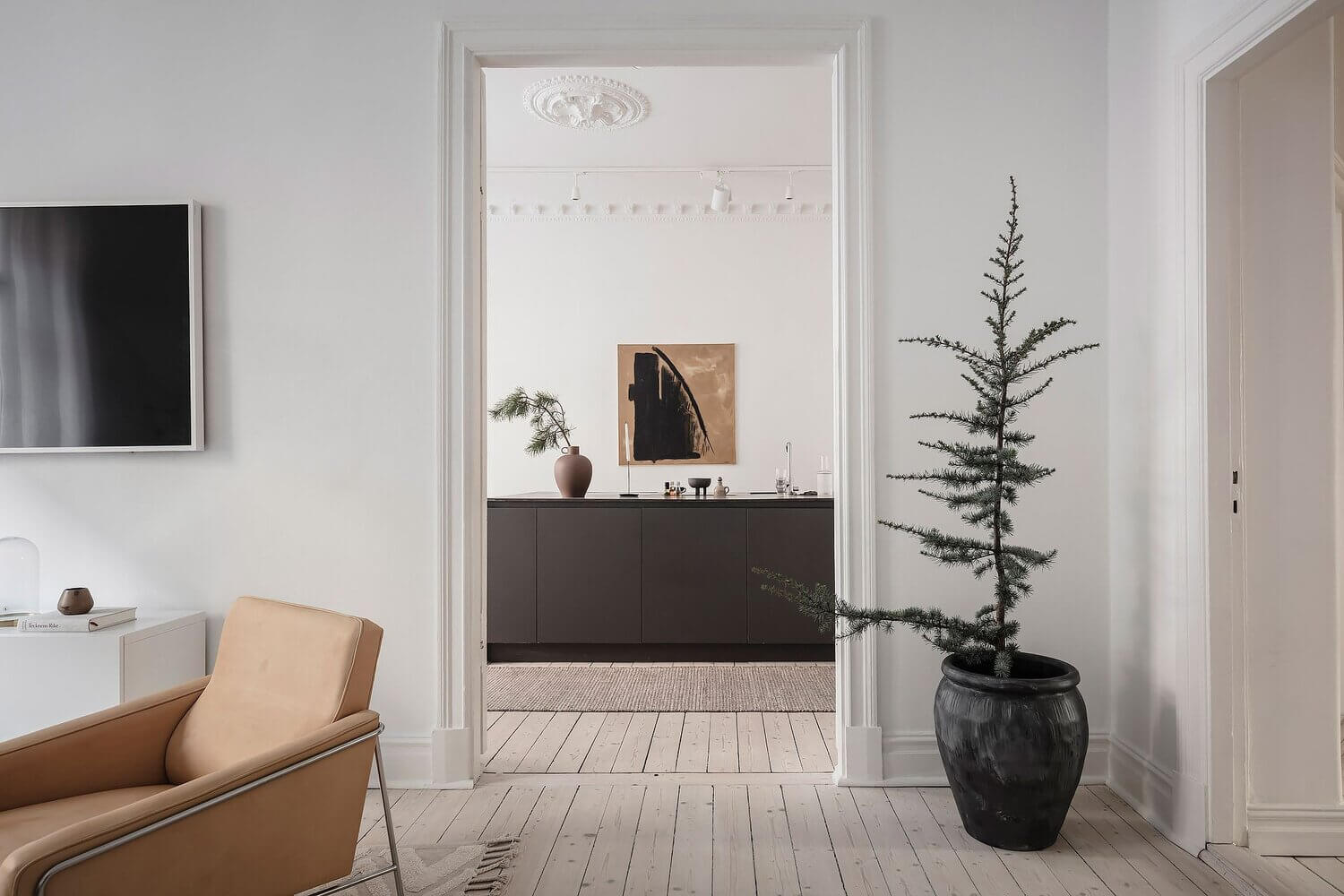A White Scandinavian Apartment With A Sleek Dark Grey Kitchen 5 white scandinavian apartment grey kitchen nordroom4 A White Scandinavian Apartment With A Sleek Dark Grey Kitchen