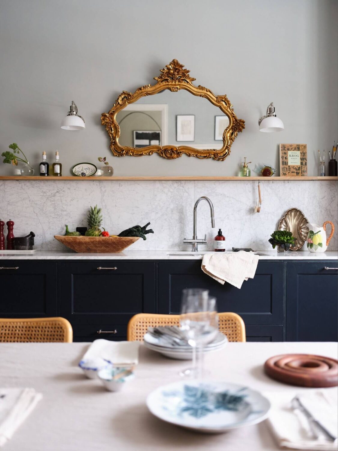 Why Everyone’s Adding Mirrors to Their Kitchens (And You Should Too) 16 colorful touches scandinavian apartment nordroom5 Why Everyone’s Adding Mirrors to Their Kitchens (And You Should Too)
