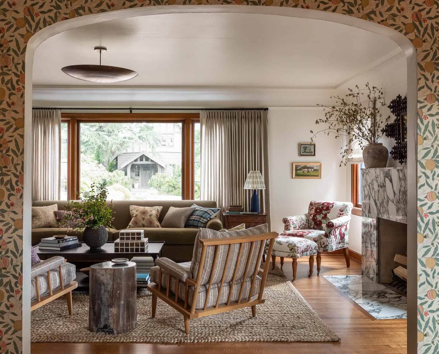 Soothing Colors in Designer Heidi Caillier's Eclectic Washington Home 7 GreenSofaFloralChairandMarbleFireplaceinDesignerHeidiCailiersWashingtonHome TheNordroom1 Soothing Colors in Designer Heidi Caillier's Eclectic Washington Home
