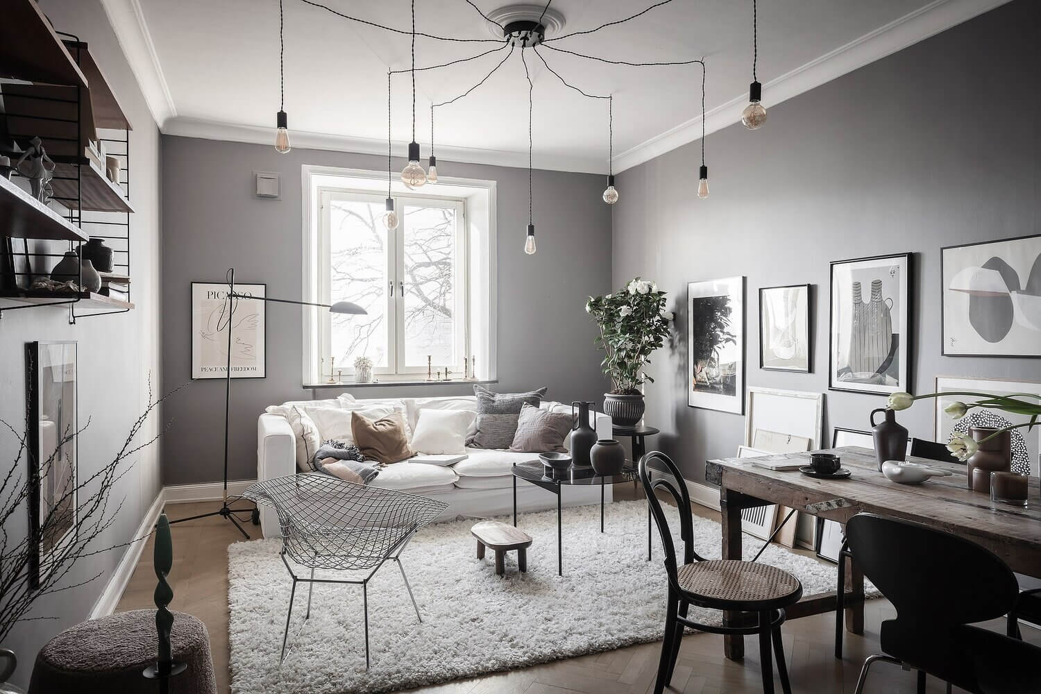 A Lovely Scandinavian Apartment with An Art-Filled Living Room 1 scandinavian apartment gallery wall nordroom A Lovely Scandinavian Apartment with An Art-Filled Living Room