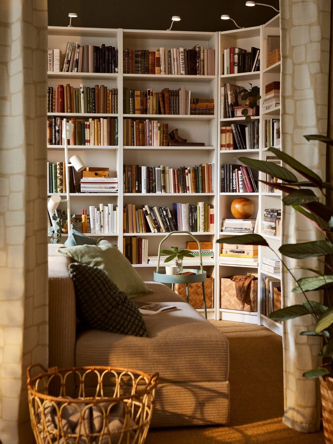 36 Home Library Ideas That Are A Book-Lover's Dream 18 warm-tones-ikea-reading-room-home-library-nordroom