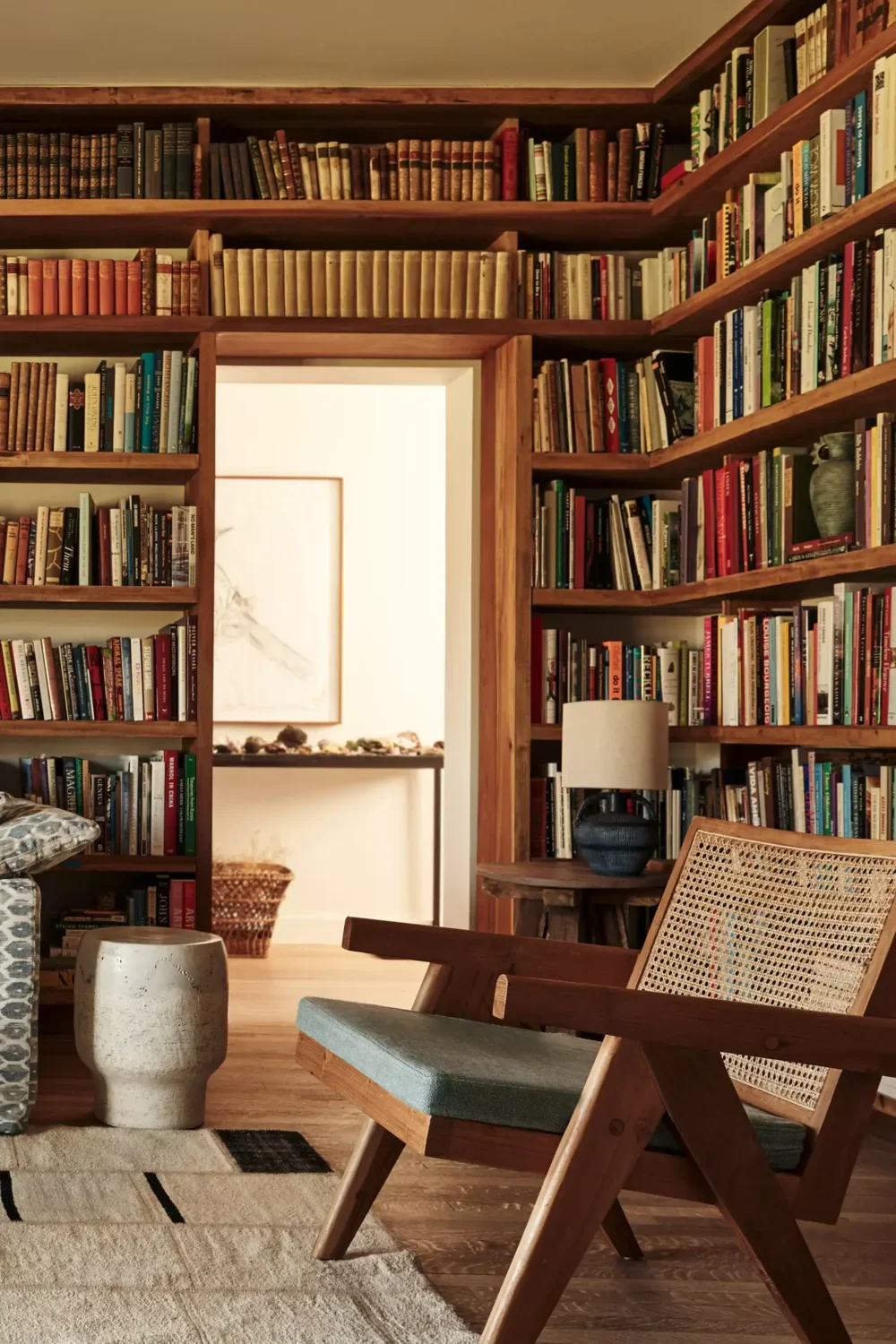 36 Home Library Ideas That Are A Book-Lover's Dream 16 warm-wood-home-library-anthropologie-nordroom