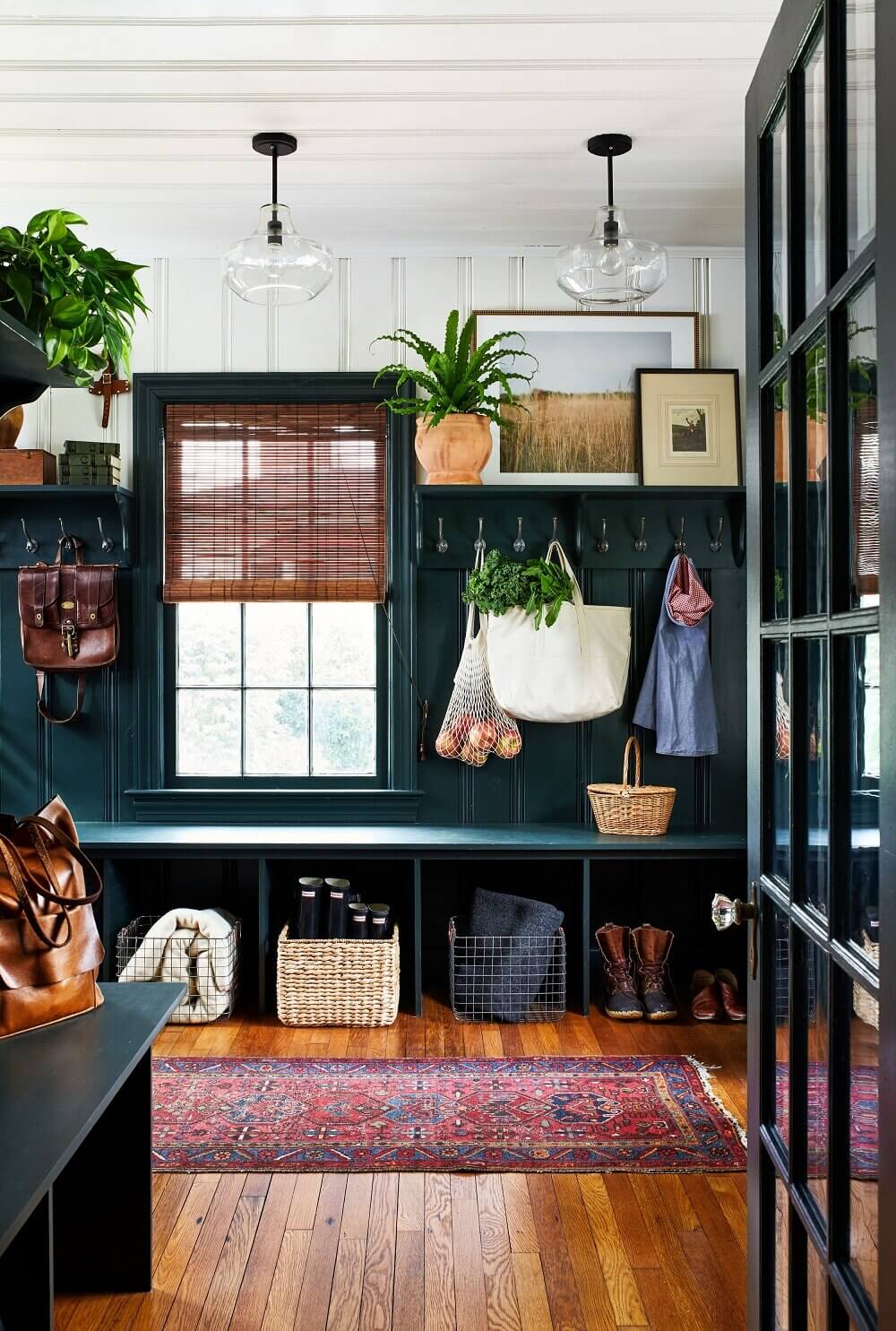 Two-Tone Walls Ideas: Create A Color Blocking Accent Wall 27 mudroom-two-tone-wall-dark-blue-white-bench