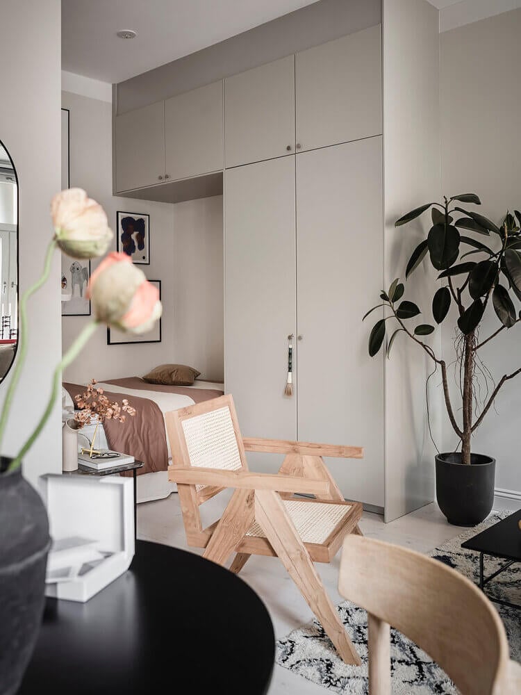 Great Living Room Bedroom Combo Ideas (Layout Tips + Styling) 42 tiny-studio-apartment-bed-nook-nordroom