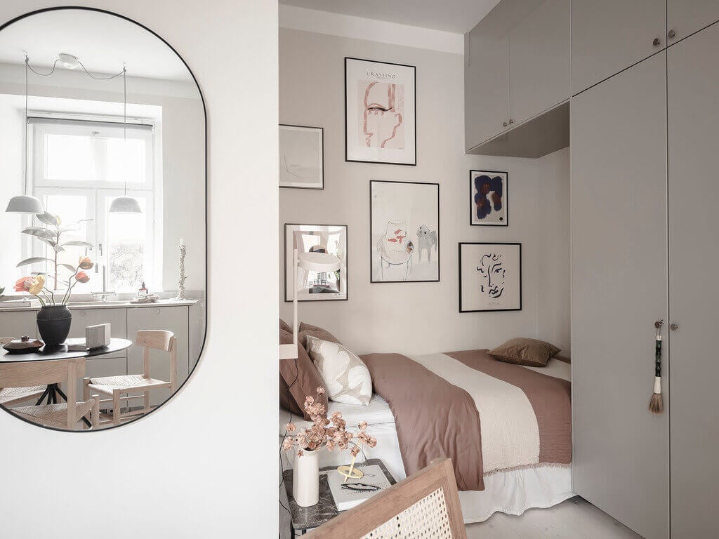 A Tiny Studio Apartment With A Storage-Filled Bed Nook 14 ATinyStudioApartmentWithAStorage FilledBedNook TheNordroom13 A Tiny Studio Apartment With A Storage-Filled Bed Nook