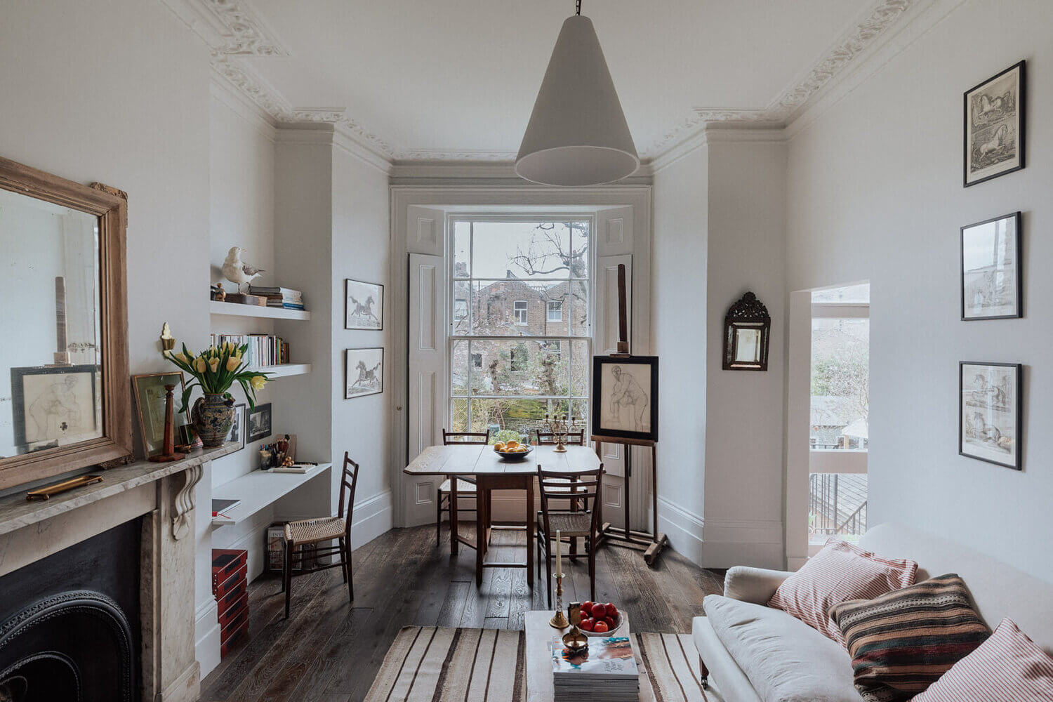 The Small London Apartment Of An Antiques Dealer 1 DarkwoodenfloorandfireplaceatTheSmallLondonApartmentOfAnAntiquesDealer TheNordroom1 The Small London Apartment Of An Antiques Dealer