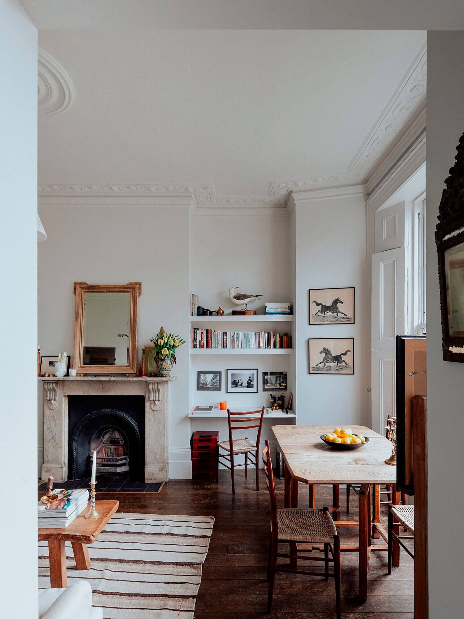 The Small London Apartment Of An Antiques Dealer 3 DiningareaandhomeofficewithornatefirelaceatTheSmallLondonApartmentOfAnAntiquesDealer TheNordroom2 The Small London Apartment Of An Antiques Dealer