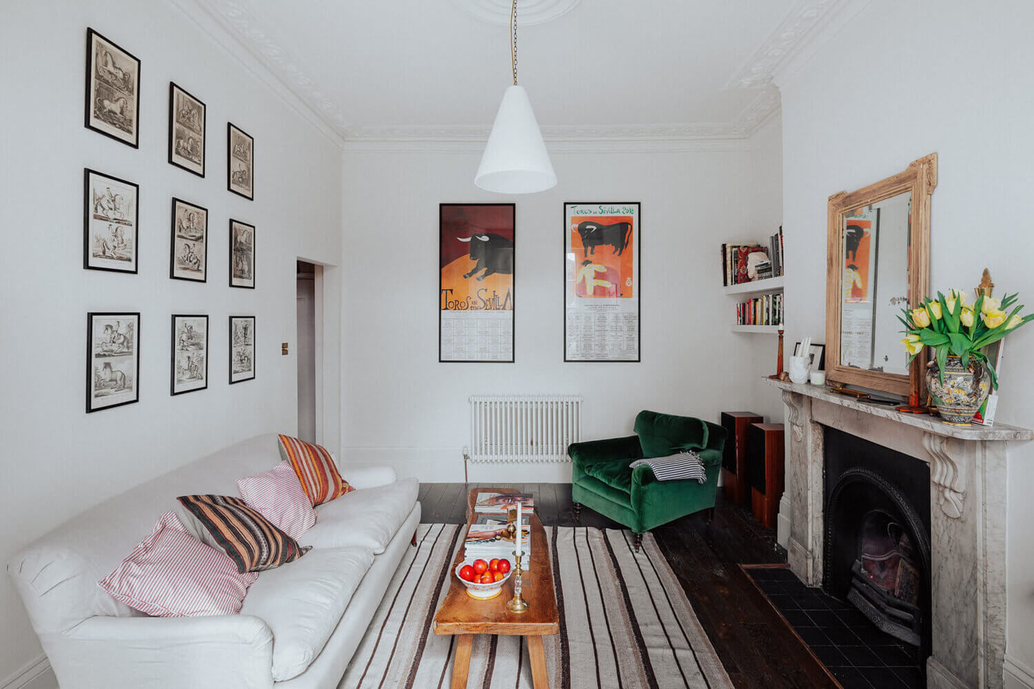The Small London Apartment Of An Antiques Dealer 6 GreenVelvetSofaandOrnateFireplaceinASmallLondonApartmentofanAntiquesDealer TheNordroom5 The Small London Apartment Of An Antiques Dealer