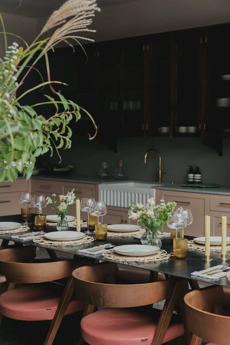 Warm Colors and Texture In A North London Family Home 5 pink-kitchen-ribbed-glass-cabinets-terrazzo-floor-london-studio-duggan-nordroom